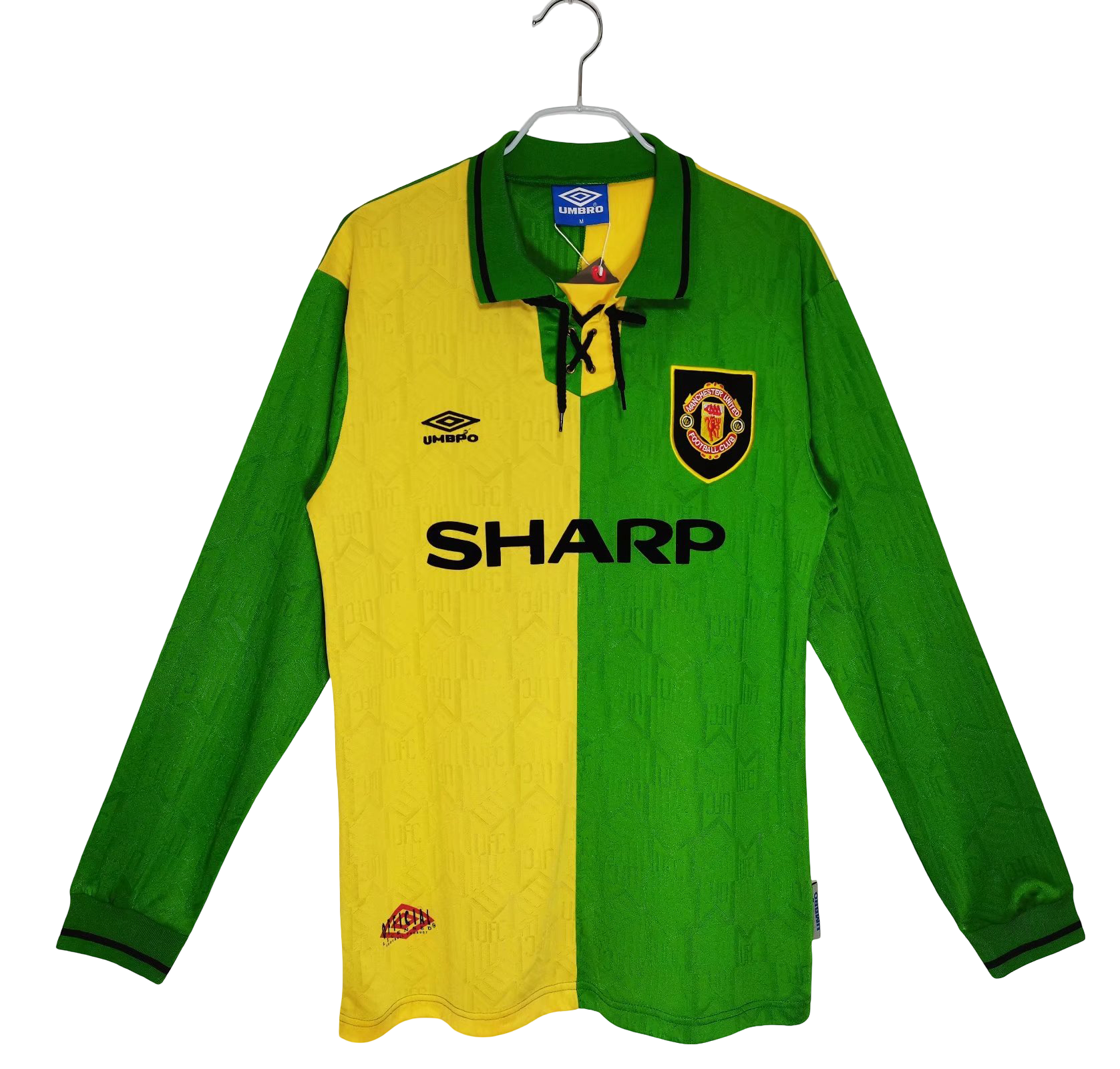 Green and yellow manchester united sports jersey from 1992/1994 with visible branding on a white background