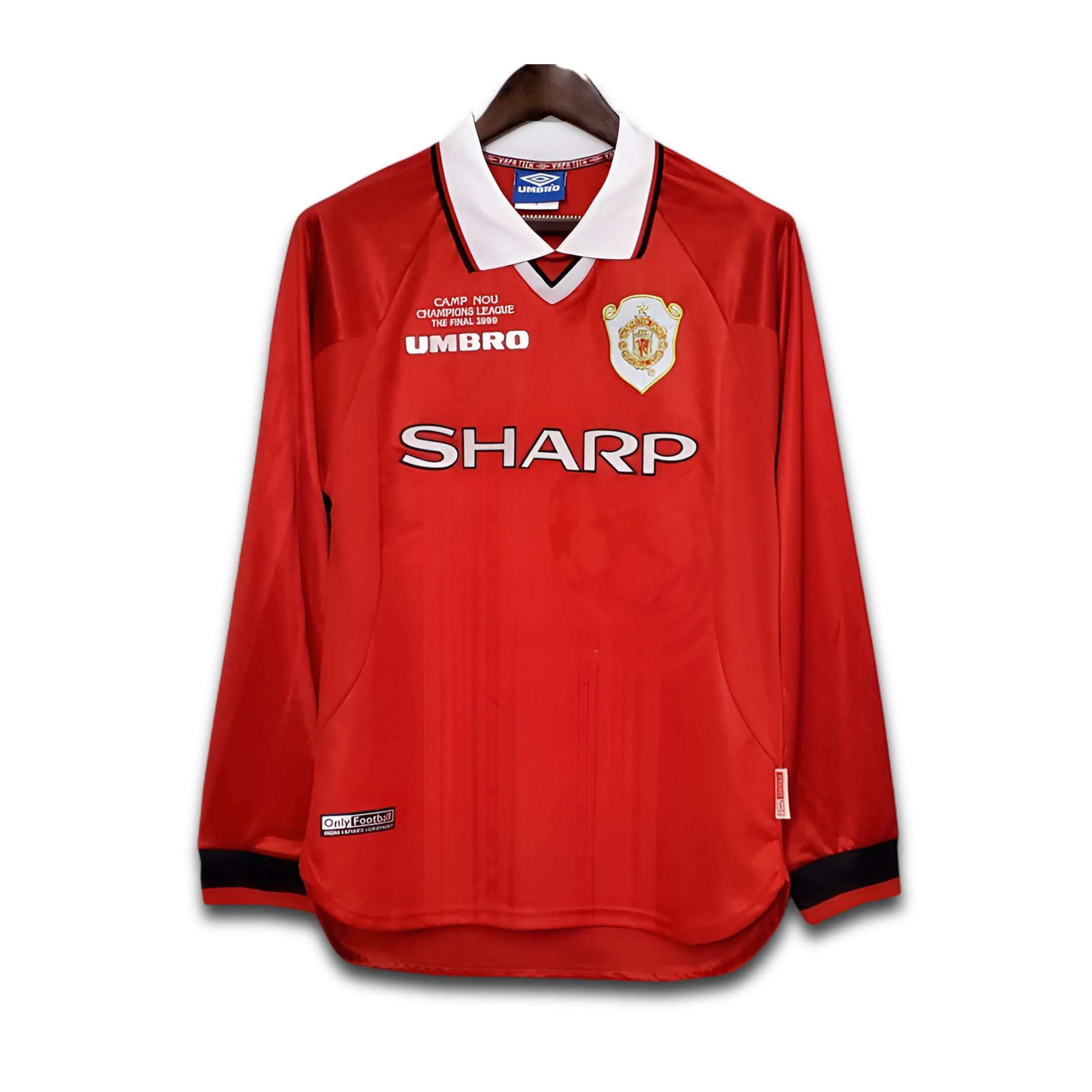 Red Manchester United 1999 UCL jersey with visible SHARP branding on a white background