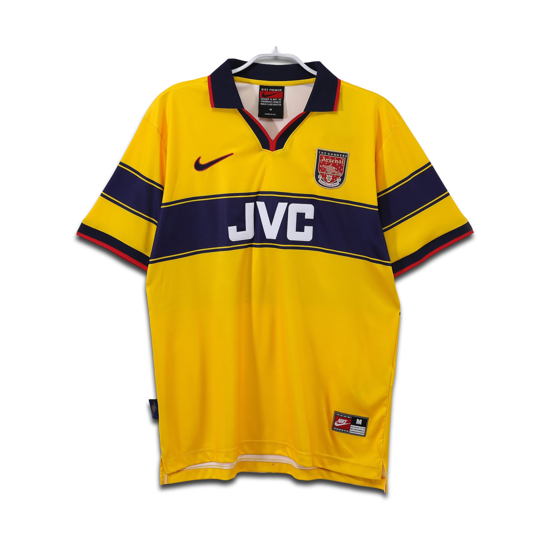 Yellow sports jersey with navy accents and JVC branding on a white background