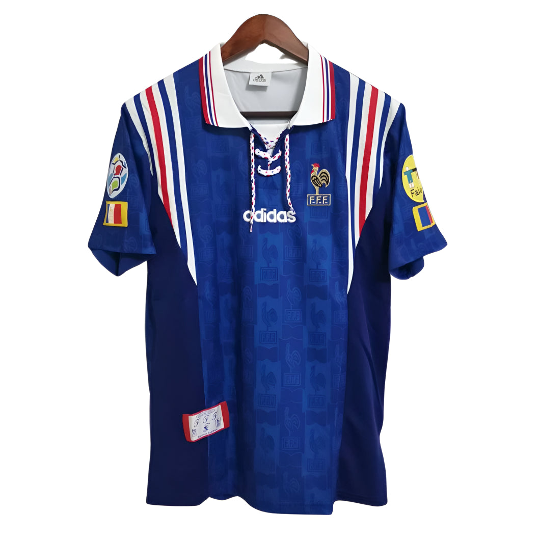 Blue sports jersey with Adidas logo on a white background