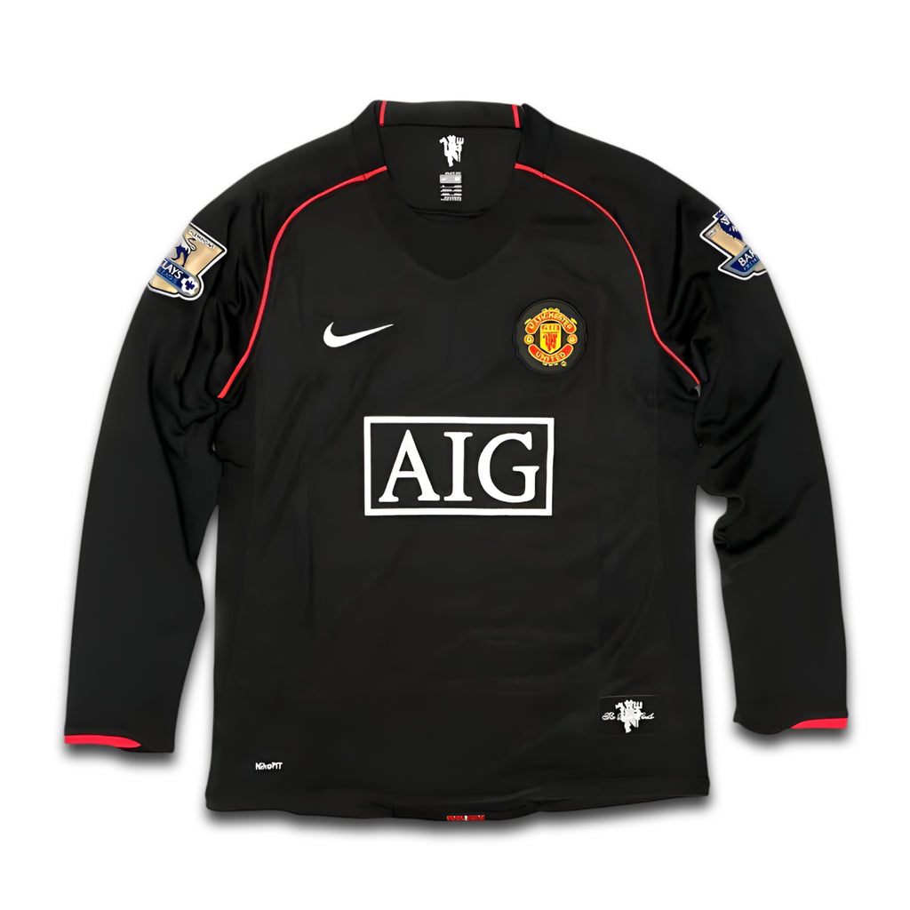 Manchester United jersey with AIG sponsor.