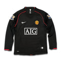 Manchester United jersey with AIG sponsor.
