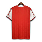 Red Arsenal football shirt from the back