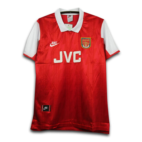 Red sports jersey with white accents and visible branding on a white background