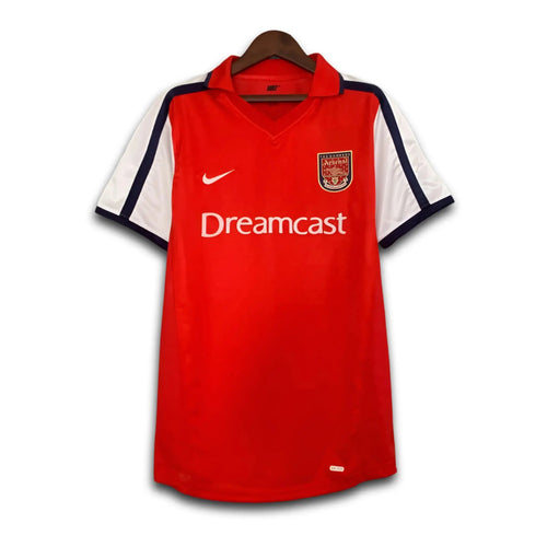 Red Arsenal jersey with 'Dreamcast' branding on a white background