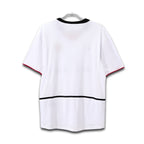 White t-shirt with black and red accents on a white background
