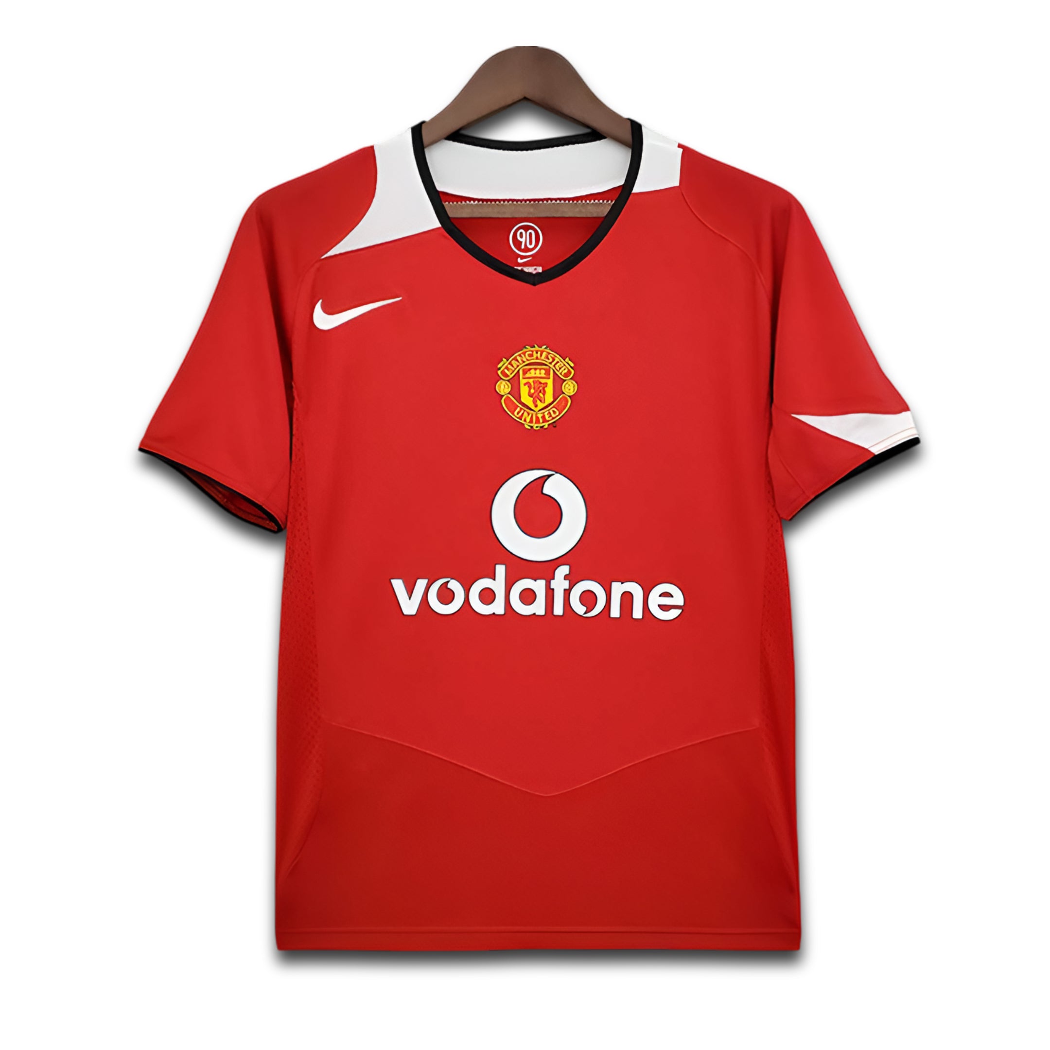 Red sports jersey with Manchester United and Vodafone logos on a white background