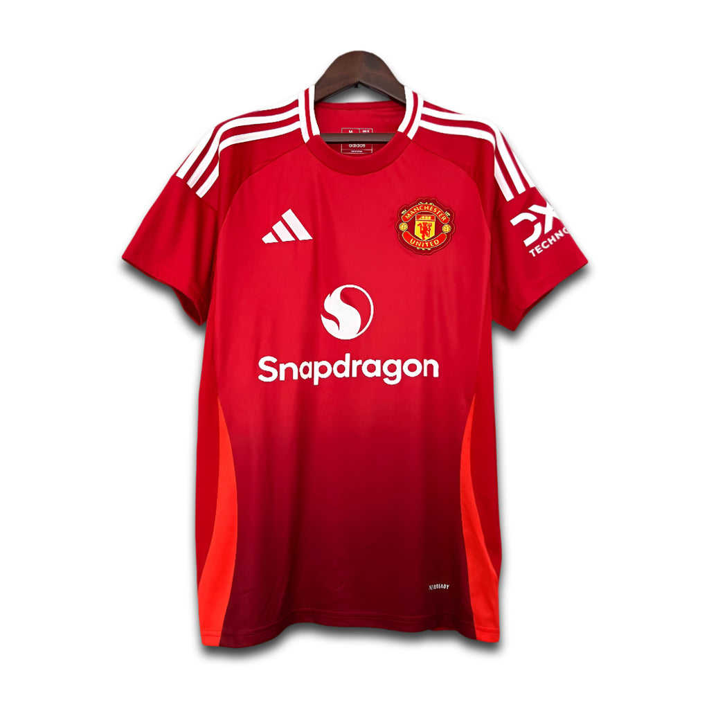 Red sports jersey with visible branding on a white background