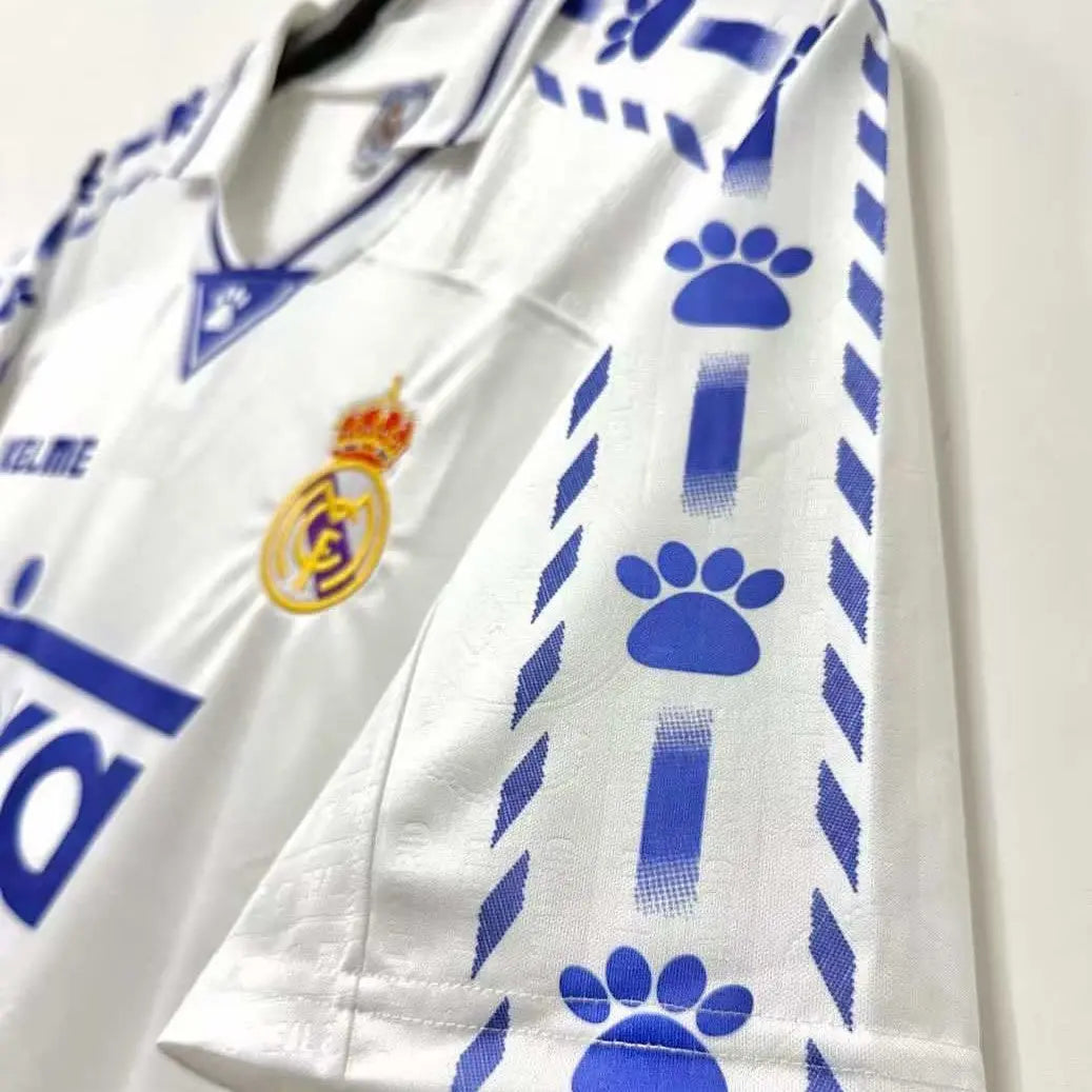 Close-up of a sports jersey with brand logos and patterns