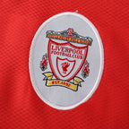 Liverpool Football Club logo on a red background