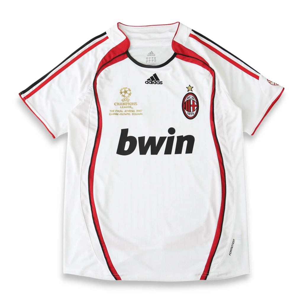 A white AC Milan soccer jersey by Adidas, featuring red and black trim, the 'bwin' sponsor logo, and the Champions League 2004-2005 final patch on the chest.