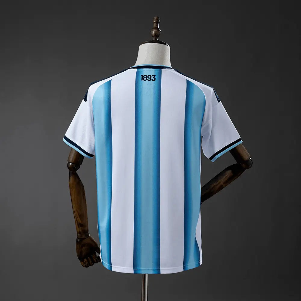 Argentina soccer jersey with Adidas logo on a beige background