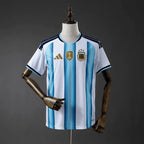 Argentina soccer jersey with Adidas logo on a beige background