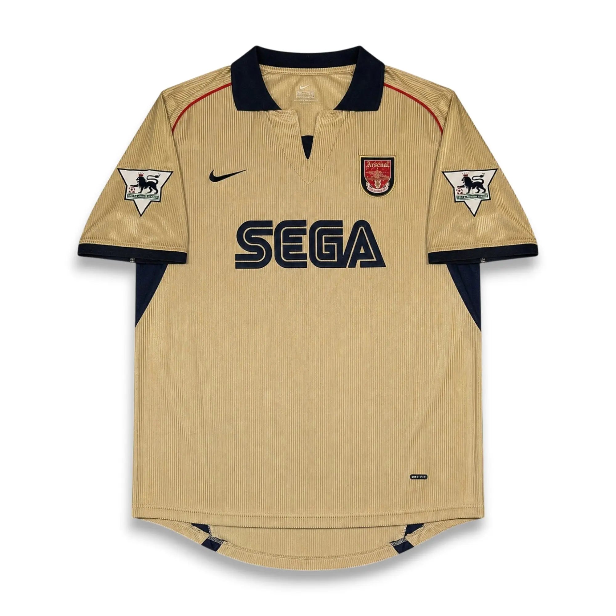 A vintage Arsenal home soccer jersey in beige with navy blue accents, featuring the SEGA sponsor logo on the chest, a Nike swoosh, and the Arsenal club crest.
