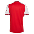 Red and white sports jersey with a visible brand logo on a white background