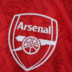 Arsenal Cannon logo sitting on a red jersey