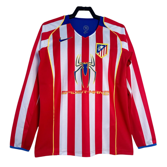 Red and white striped shirt with Spider-Man logo on a hanger