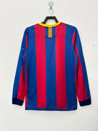 Blue and red striped long-sleeve shirt on a hanger against a white background