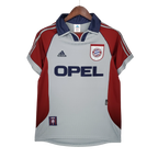 Red and gray sports jersey with Opel and Adidas logos on a hanger