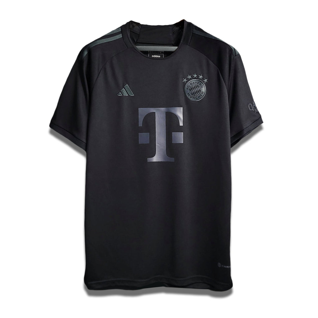 Limited Edition Blackout Home shirt from Bayern Munich's 2023/24 Season, predominantly black with a large 'T' logo on the front.