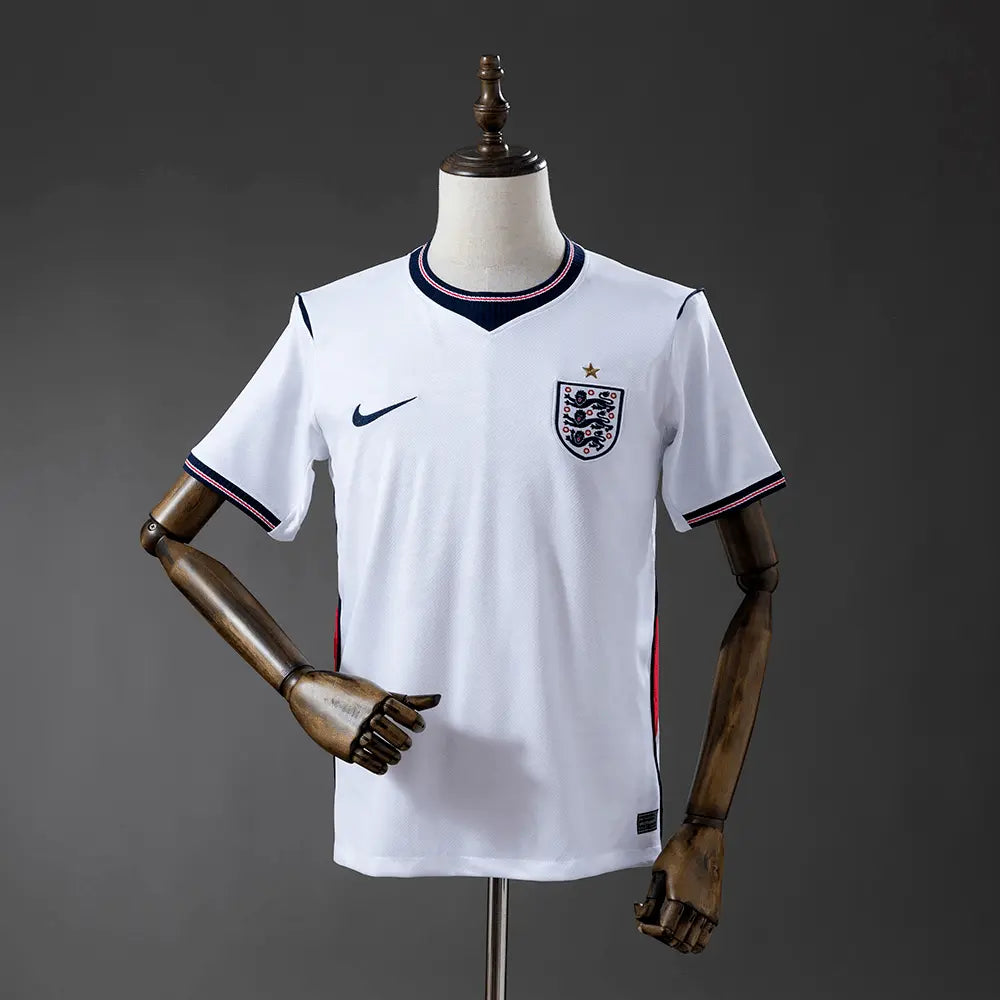 White England jersey with Nike logo on a wooden mannequin against a gray background