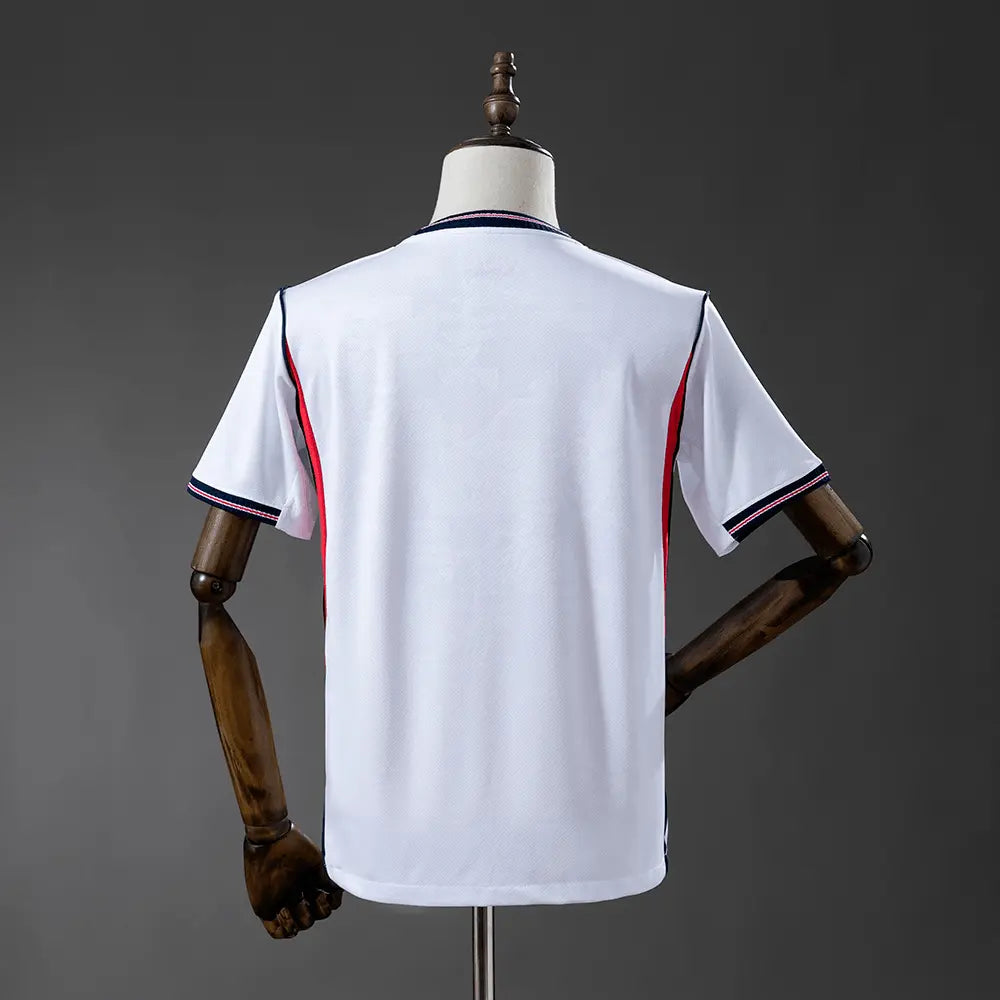 White England jersey on a wooden mannequin against a gray background