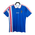 Blue France soccer national team jersey with red and white accents on a hanger