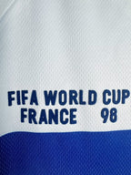 Text 'FIFA World Cup France 98' on a sports jersey with blue and white colors.