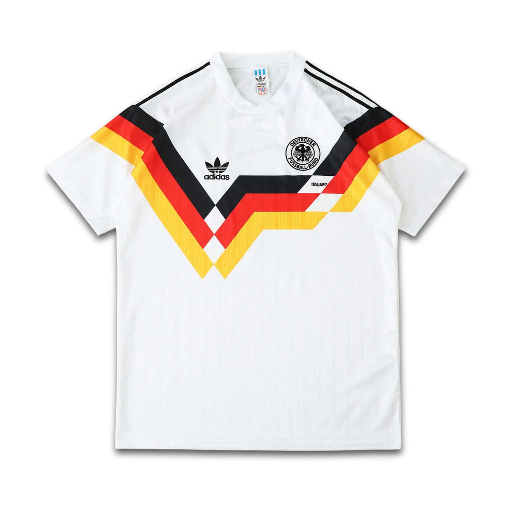 White Germany 1990 jersey with Adidas logo and German flag design on a white background