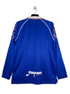 Blue sports jersey with 'Japan' text on a white background