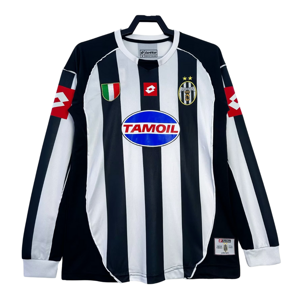 Black and white striped sports jersey with various logos on a white background