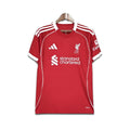 LFC Red Sports jersey with Standard Charted sponsorship on a white background.