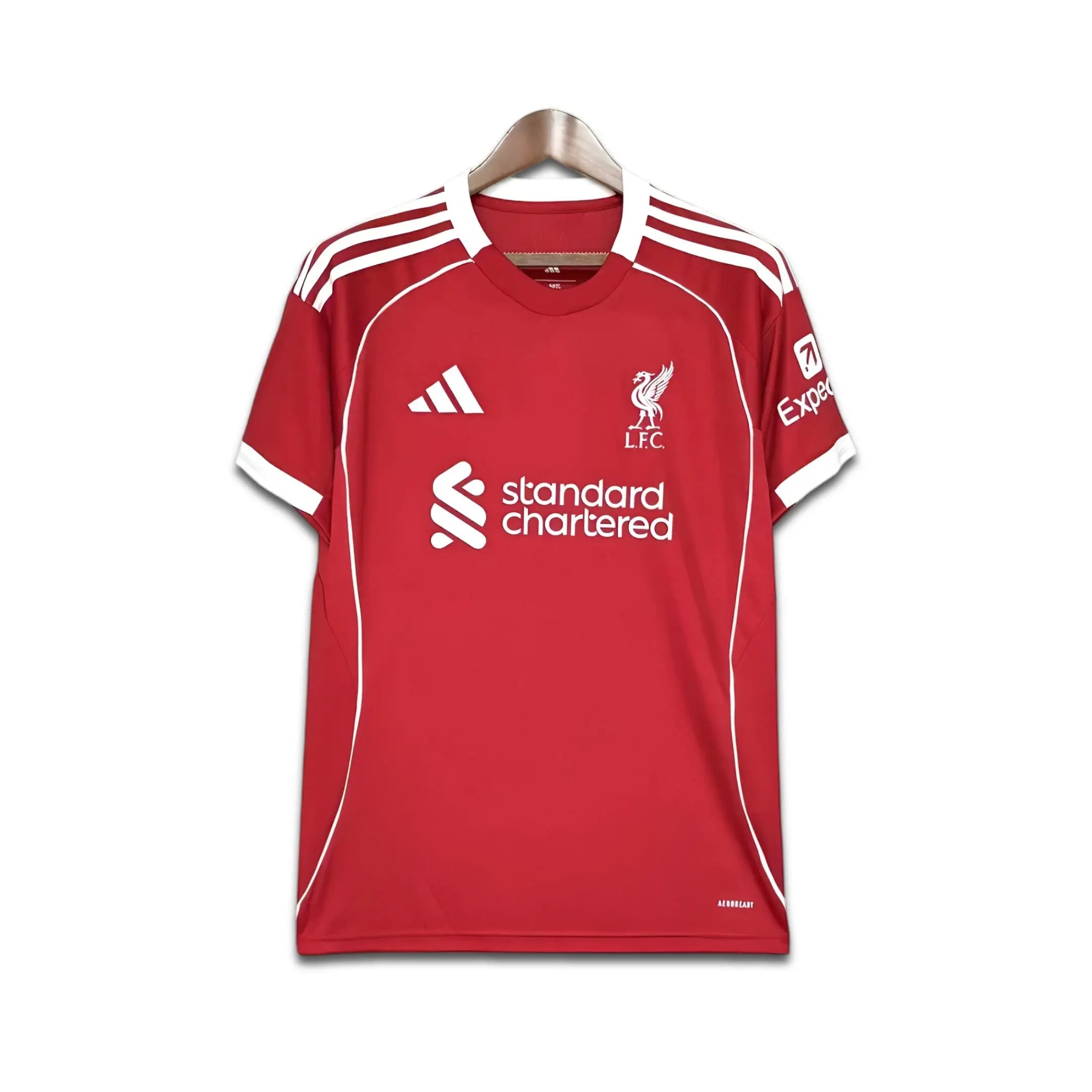 LFC Red Sports jersey with Standard Charted sponsorship on a white background.
