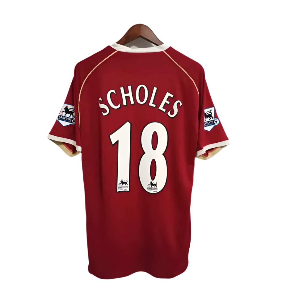 Manchester United retro AIG shirt from the 2006/07 season where legends of the game like Cristiano Ronaldo, displayed his excellence in Manchester Red.