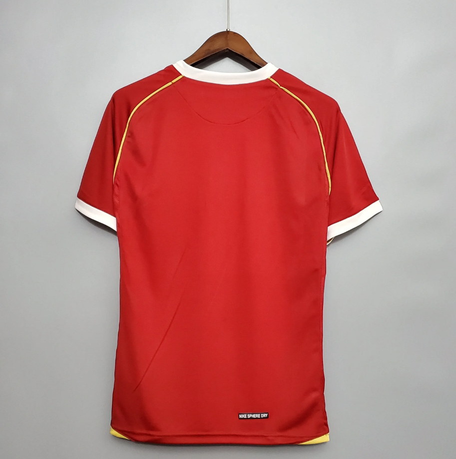 Manchester United retro AIG shirt from the 2006/07 season where legends of the game like Cristiano Ronaldo, displayed his excellence in Manchester Red.