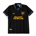 A black vintage Manchester United football jersey with gold and blue accents, featuring the 'Sharp Viewcam' sponsor logo on the front, by Umbro.