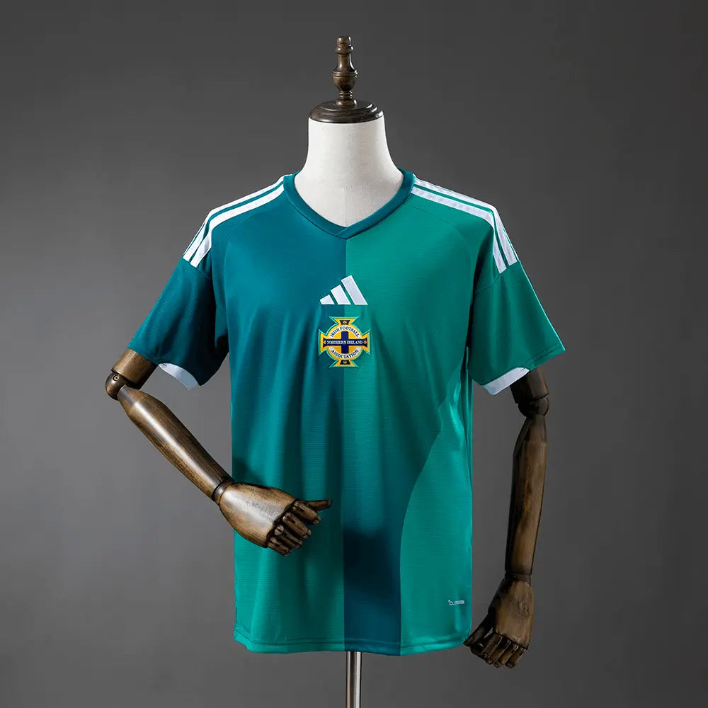 Green Northern Ireland jersey in photoshoot room.