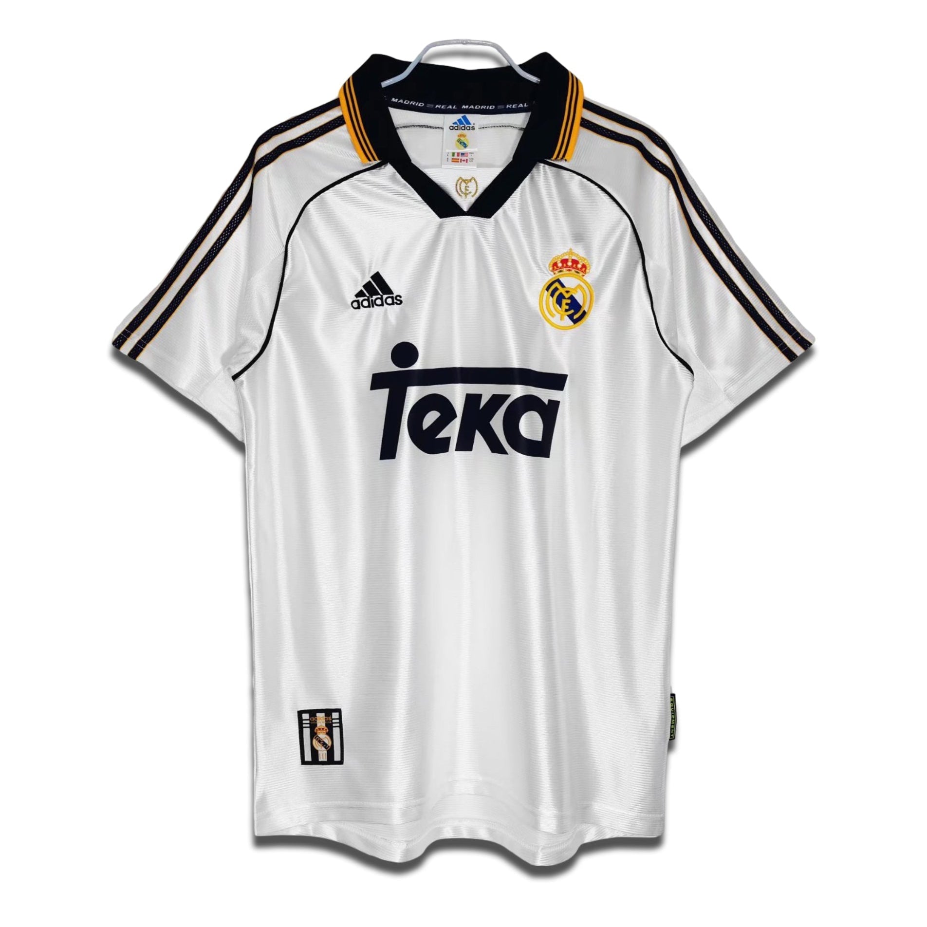 Real Madrid 1999/00 home shirt with TEKA sponsor logo, predominantly white with black and gold accents.