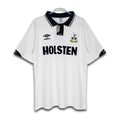 A white Tottenham Hotspur home shirt from the 1991/93 season with the Holsten sponsor logo and Hummel chevrons.