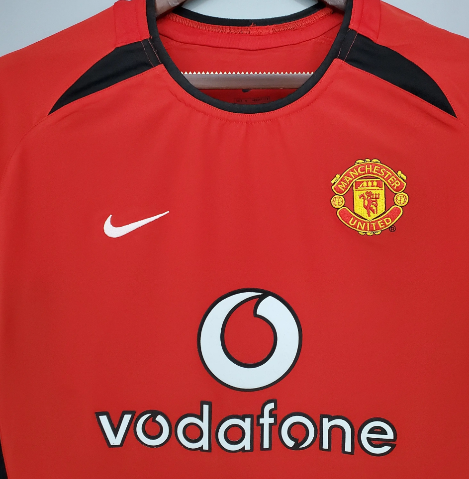 Vodafone sponsor on 2002 Manchester United shirt.
