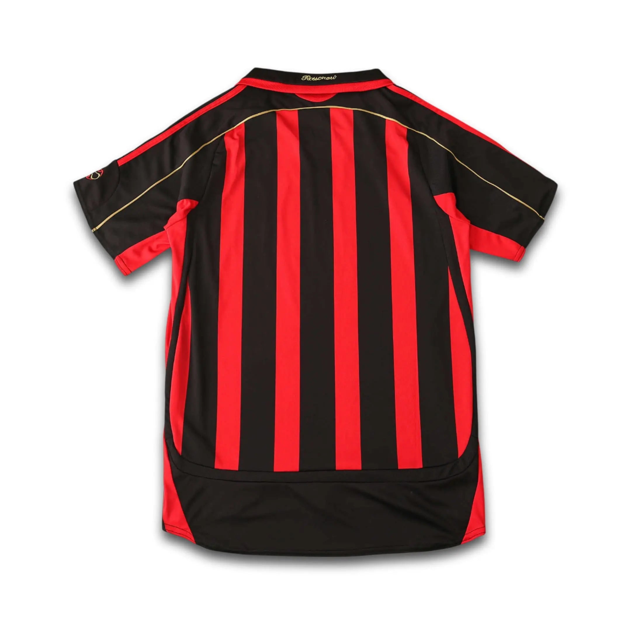 AC Milan BWIN home shirt sitting on a white background in an elegant setting.