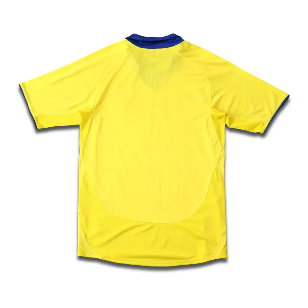 Yellow Arsenal jersey with Navy trims.