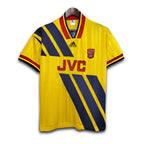 Yellow Arsenal shirt with JVC Adidas sponsoring and Blue stripes.