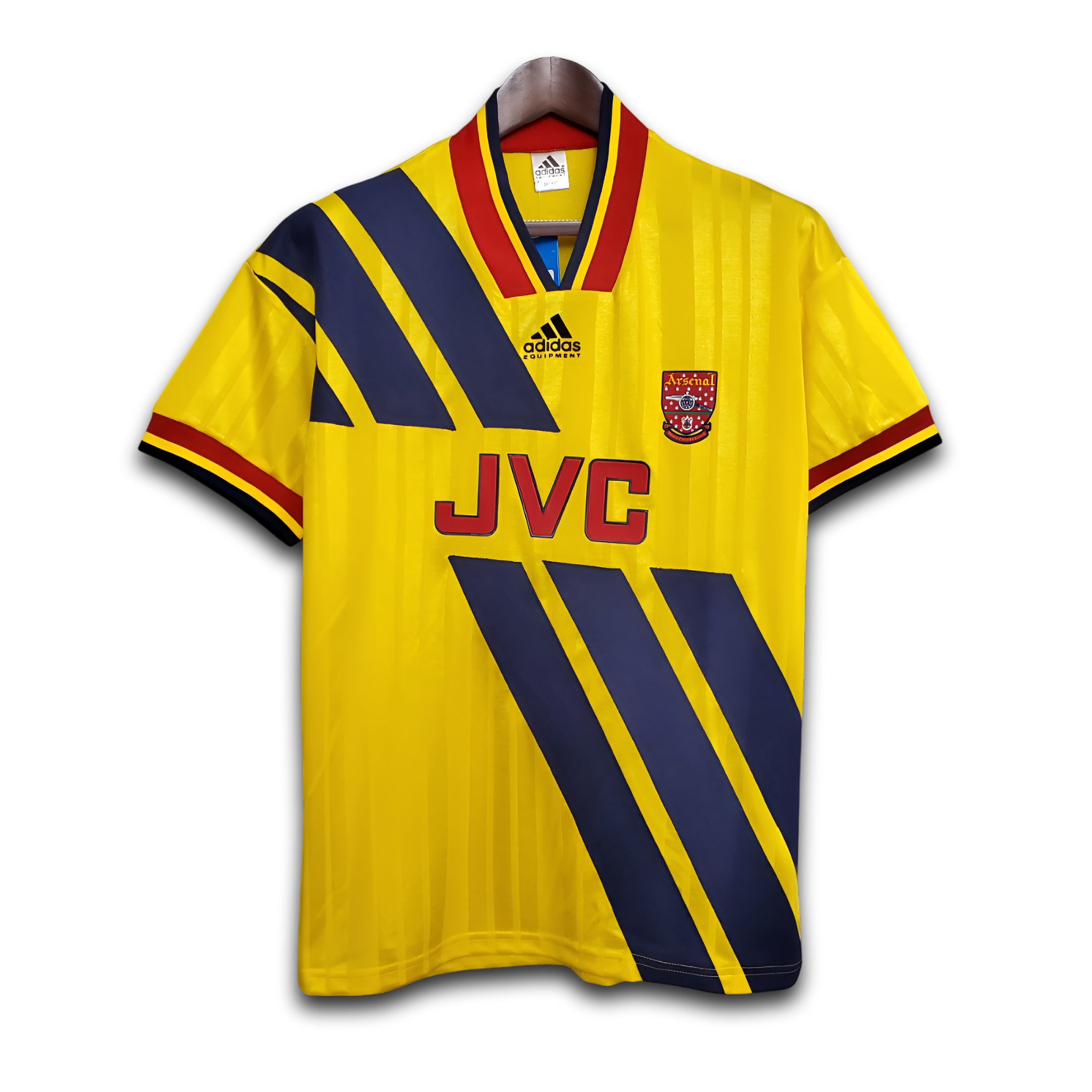 Yellow Arsenal shirt with JVC Adidas sponsoring and Blue stripes.