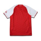 Arsenal Red and White jersey from behind, sitting on a white background with a subtle drop shadow.