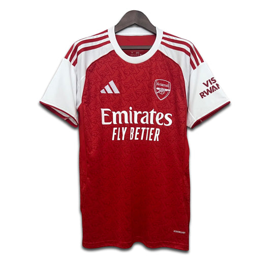 Red and white Arsenal football jersey with Adidas logo on a hanger
