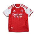 Arsenal Red and White jersey with Emirates Sponsor, sitting on a white background with a subtle drop shadow.