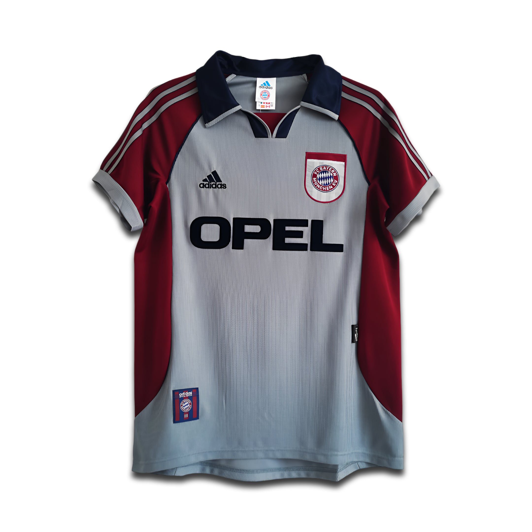 Red and gray sports jersey with Opel and Adidas logos on a hanger