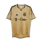 Gold Bayern Munich T-Com away shirt