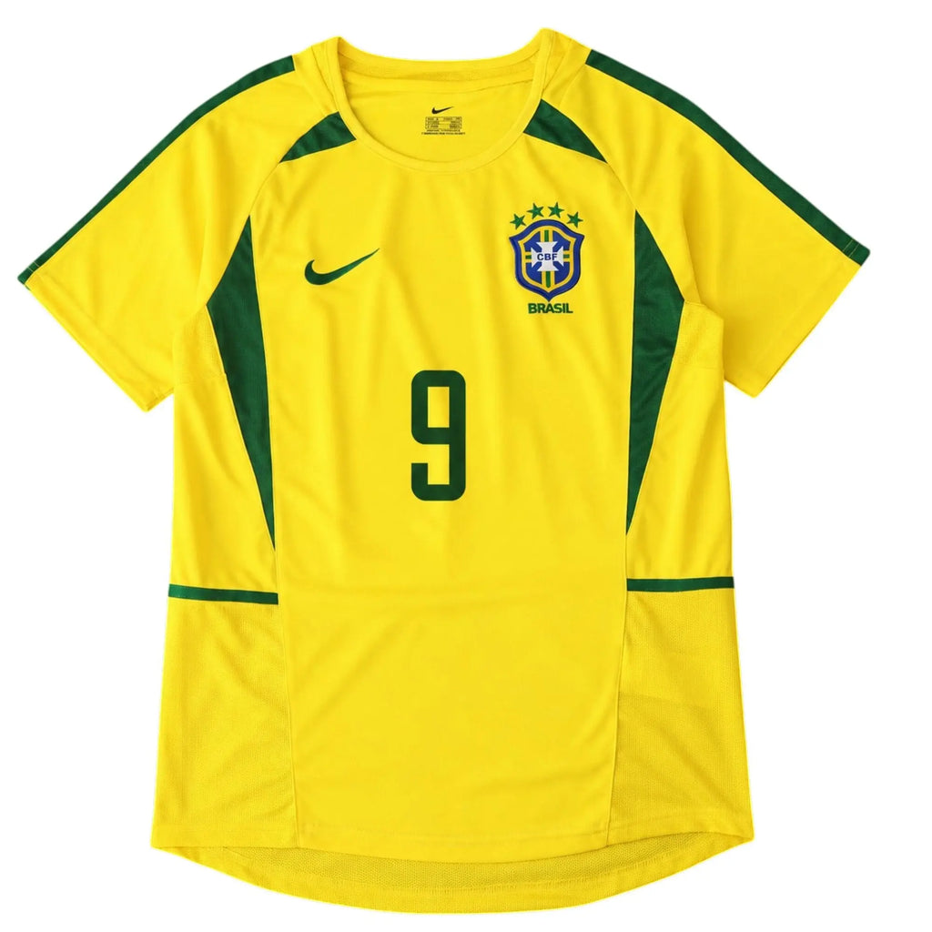 A yellow Nike Brazil national team soccer jersey with green accents, featuring the number 9 on the front, the Nike swoosh, and the Brazil crest.